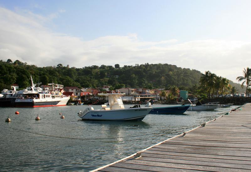 Fishing boats are adjacent to passenger boats