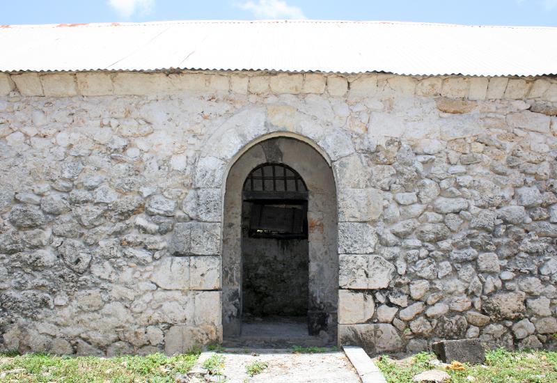 The arched stone door