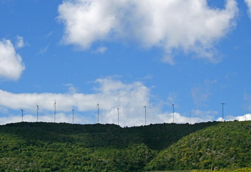 Wind turbines - The Desirade, Guadeloupe. Aligned at the top of Plateau de la Montagne