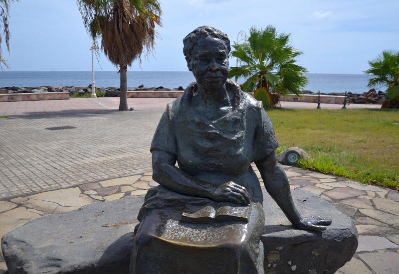 Guadeloupe - Basse-Terre, seafront. Bronze sculpture of Gerty Archimede
